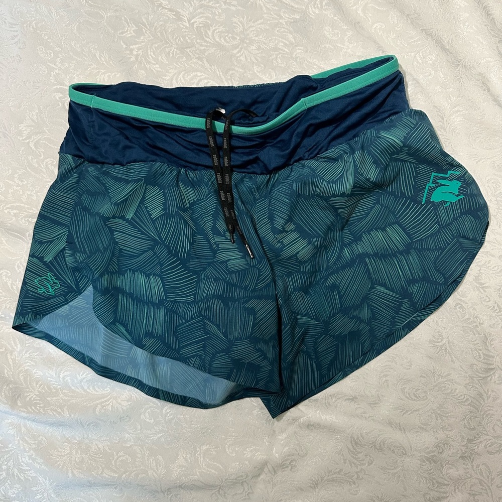 Rabbit women trail running shorts blue and turquoise 4” inseam medium